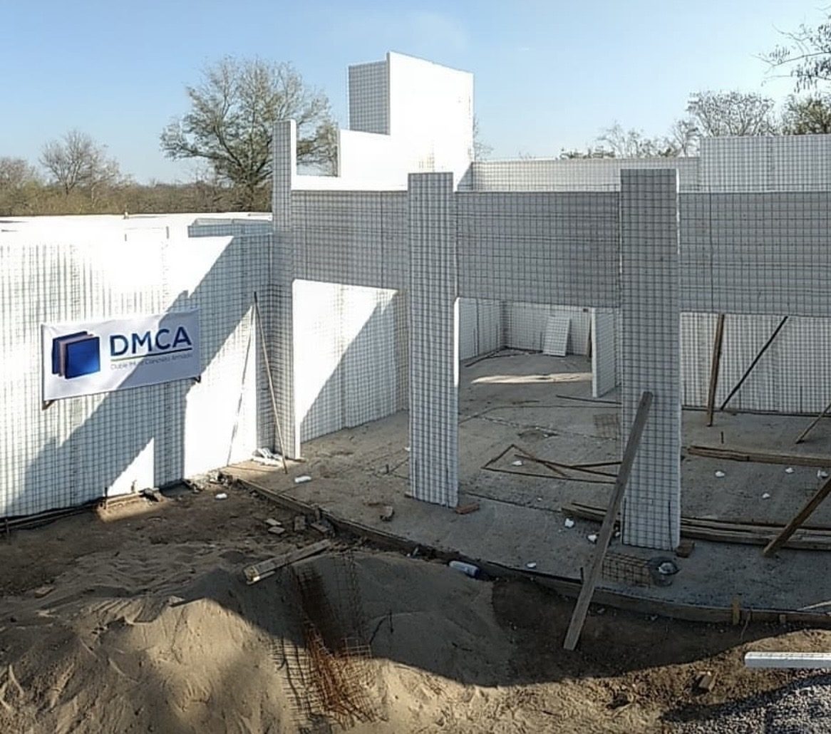 Estructura con hormigón proyectado sobre los paneles — doble muro de concreto armado
